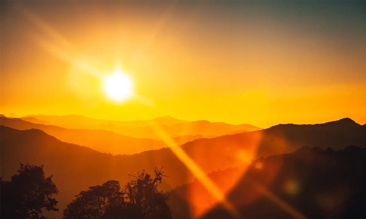 Sunrise above peak in the Himalaya range, Nepal.